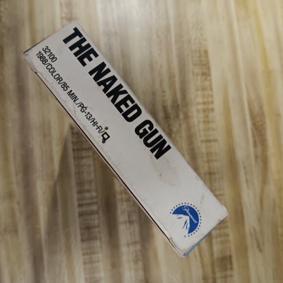 The Naked Gun VHS 1988 Leslie Nielsen Zucker Priscilla Presley Weird Al OJ VTG - Picture 5 of 8